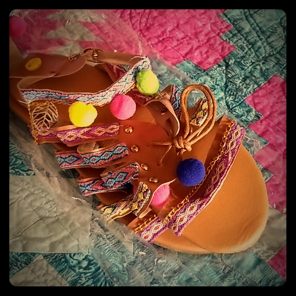 Sandles, flats w/fun detailing at straps